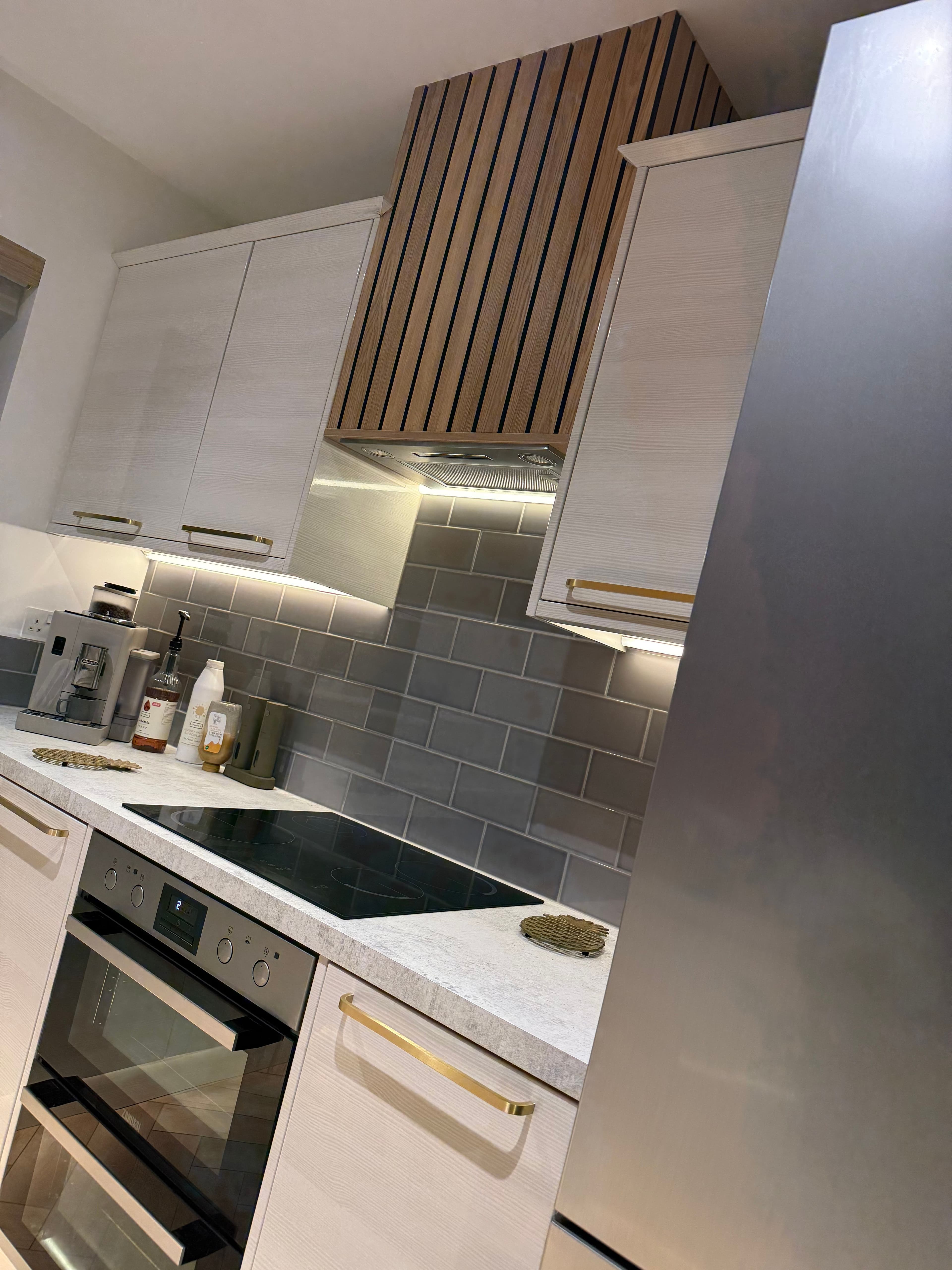 Custom Cooker Hood Cladding (Beare Green) - Custom-built extractor hood cladding designed to match contemporary kitchen cabinetry.