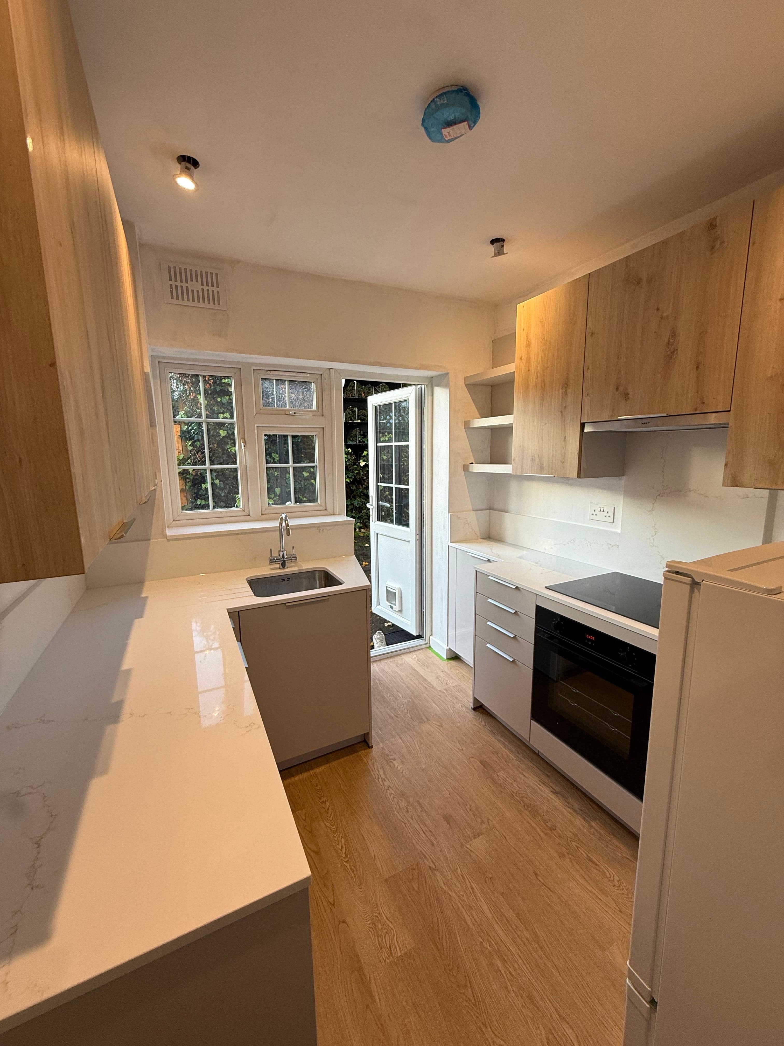 Kitchen Renovation (Long Ditton) - Full kitchen transformation featuring modern cabinetry assembly and premium hardware installation.